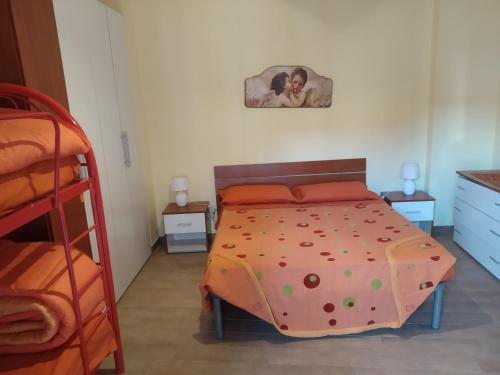Кровать или кровати в номере Appartamento Valle dei Templi