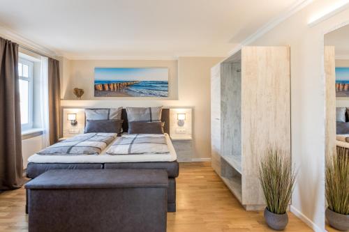 Postel nebo postele na pokoji v ubytování Nordic Wave Apartments