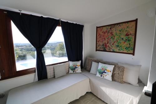 A bed or beds in a room at Carlo Apartments