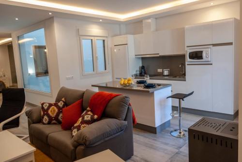 Kuchyňa alebo kuchynka v ubytovaní Apartamentos Cantarería, Azahar