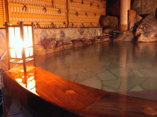 a pool of water with a light on top at Inatori Tokai Hotel Yuen in Higashiizu