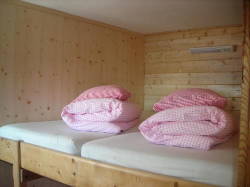 Кровать или кровати в номере Skihütte Zams