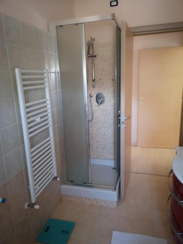 a shower with a glass door in a bathroom at B&B Stella Di Mare in Termoli