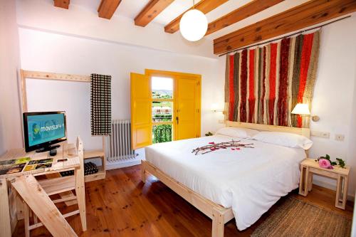 Postel nebo postele na pokoji v ubytování Posada Hoyos de Iregua