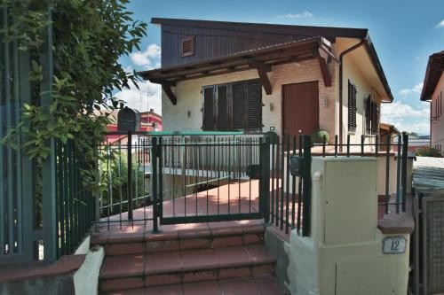an iron gate in front of a house at EuroHome Comfort Apartment in Signa