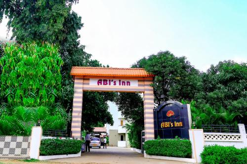 an entrance to a gas station in a park at Hotel Abi's Inn in Thanjāvūr