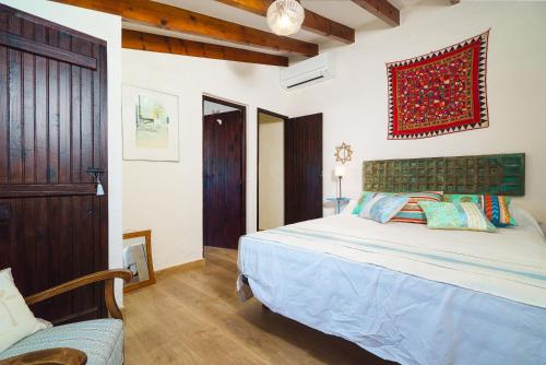 Katil atau katil-katil dalam bilik di Villa Pinella