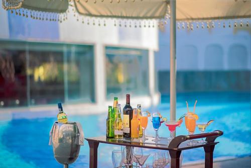 Nápoje v ubytování Radisson Blu Udaipur Palace Resort & Spa