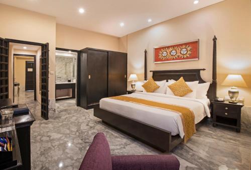 Postel nebo postele na pokoji v ubytování Radisson Blu Udaipur Palace Resort & Spa