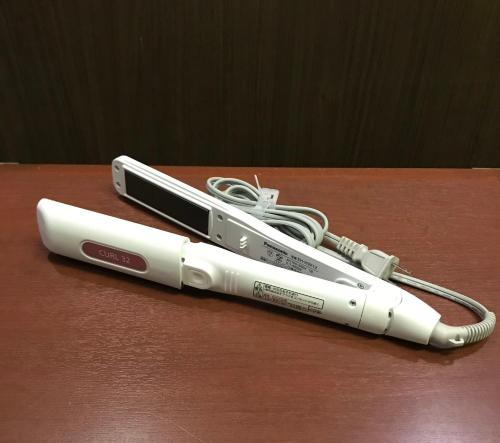twointendo wii controllers sitting on top of a table at Hotel 1-2-3 Kokura in Kitakyushu