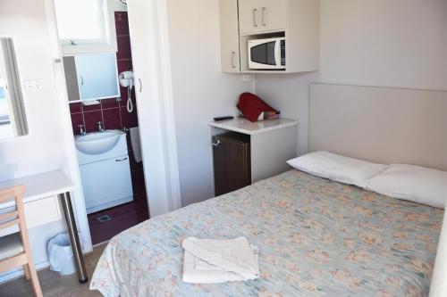 Katil atau katil-katil dalam bilik di Hillview Motel