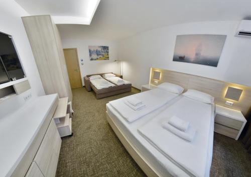 Llit o llits en una habitació de Apartment OneClickRent_06-Smart House