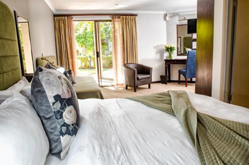 Ein Bett oder Betten in einem Zimmer der Unterkunft Browns Manor