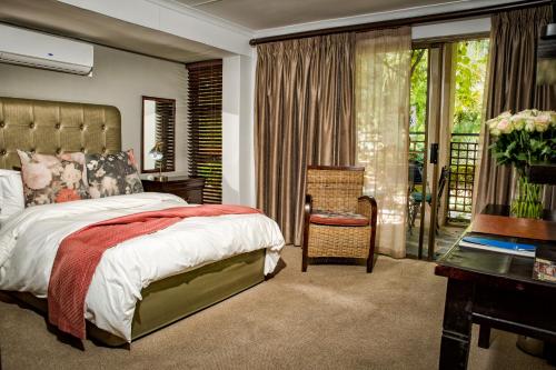Un pat sau paturi într-o cameră la Browns Manor