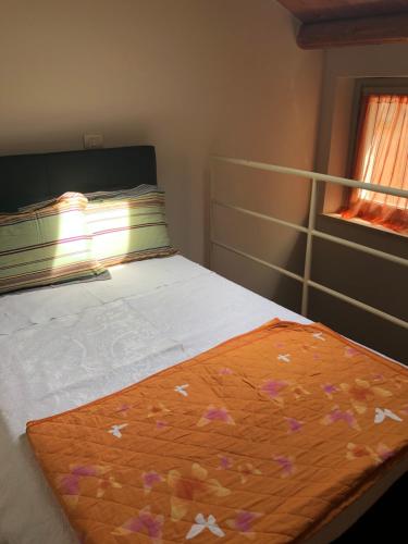 Ein Bett oder Betten in einem Zimmer der Unterkunft La Dimora di Cesare