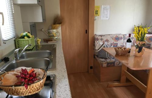 Kuchyň nebo kuchyňský kout v ubytování Camping San Giusto