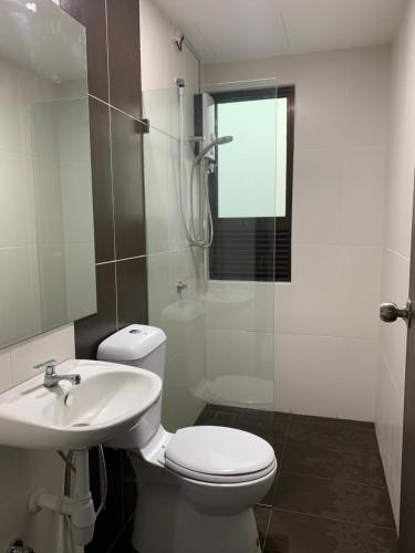 a bathroom with a toilet and a sink and a shower at Kyra The Heights Residence Condo Ayer Keroh Melaka WiFi, Netflix & Pool in Ayer Keroh
