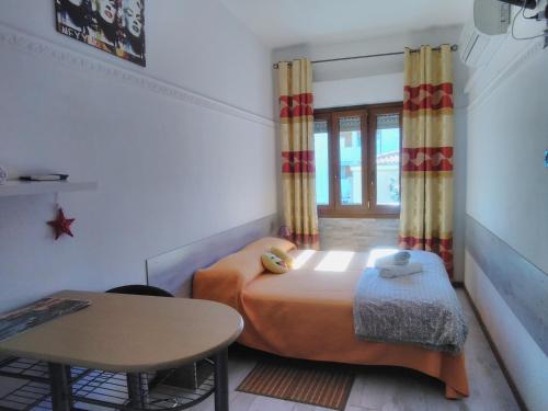 Postel nebo postele na pokoji v ubytování B&B Alghero Republic