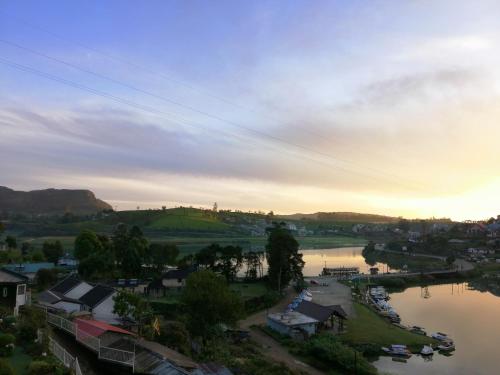 a view of a town with a river and a city at Melford Nuwaraeliya in Nuwara Eliya