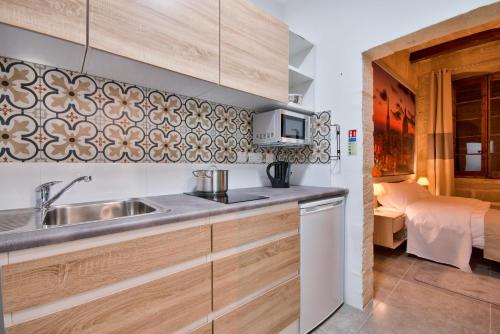 Kuchyň nebo kuchyňský kout v ubytování Laparelli Suites: Luxury Suite 2