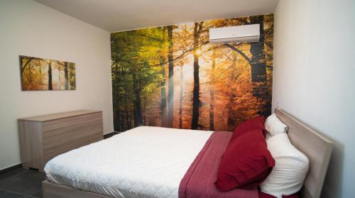 Postel nebo postele na pokoji v ubytování RESIDENZA FIGURUJA
