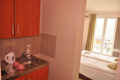 Postel nebo postele na pokoji v ubytování Guest House Damjana