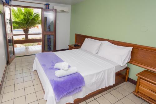 Posteľ alebo postele v izbe v ubytovaní Hotel Oceano Porto