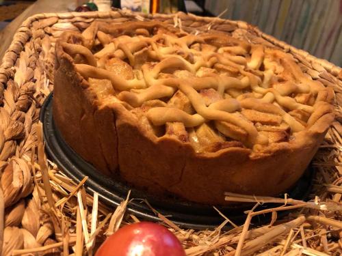 a apple pie sitting on top of a table at feels Beach Club Hotel in Kühlungsborn