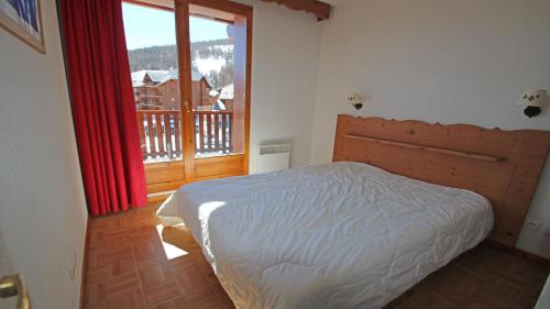 Katil atau katil-katil dalam bilik di Les Gentianes - Cimes et Neige