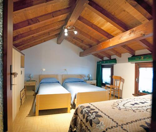 Postel nebo postele na pokoji v ubytování Albergo Diffuso Faller