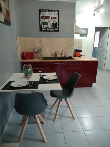 Η κουζίνα ή μικρή κουζίνα στο appartements et