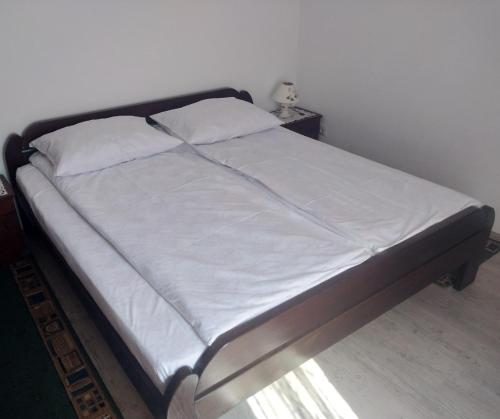 Una cama o camas en una habitación de Sokobanja Apartmani