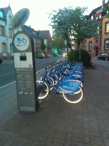 a row of bikes parked on the side of a street at Zweibettzimmer in Kaiserslautern