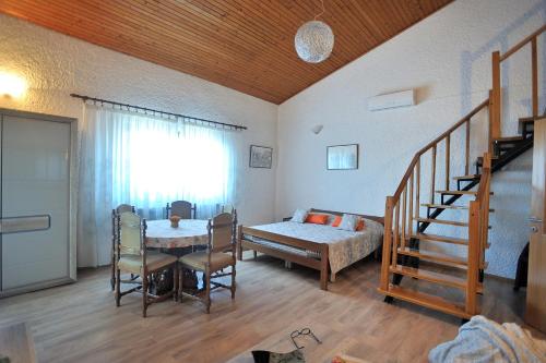 Posteľ alebo postele v izbe v ubytovaní Apartments Fabac