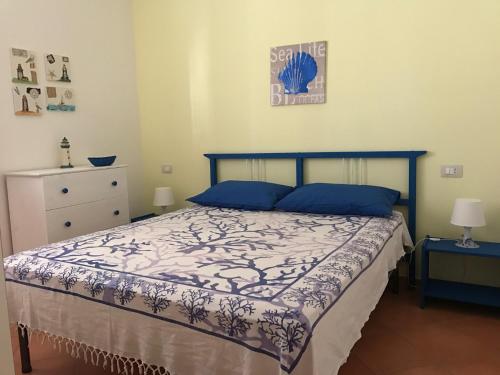 Postel nebo postele na pokoji v ubytování Appartamento Silva