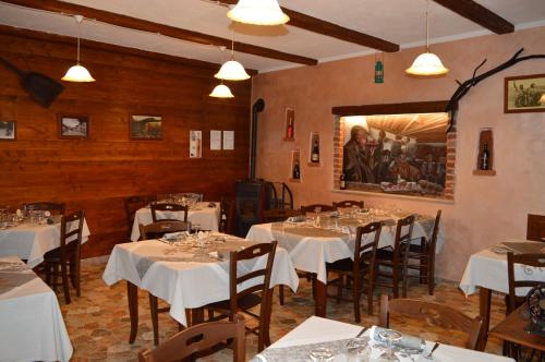 Reštaurácia alebo iné gastronomické zariadenie v ubytovaní La Slitta