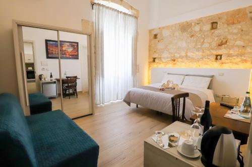 Postel nebo postele na pokoji v ubytování La Sicilia in un sogno
