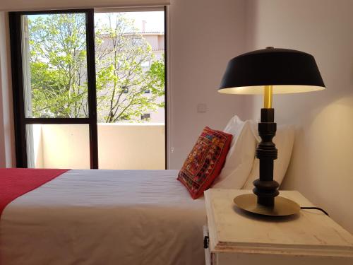 Katil atau katil-katil dalam bilik di Ocean Cascais - Apartment with Swimming Pool