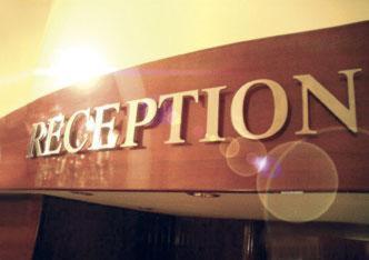 a sign for a room with the word reception at Buchholz Downtown Hotel in Cologne
