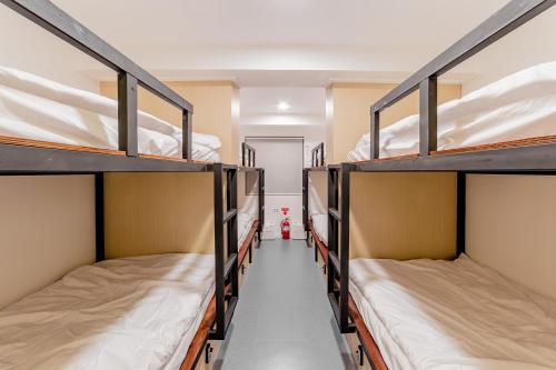 Ένα ή περισσότερα κρεβάτια σε δωμάτιο στο Guesthouse Dear Moon