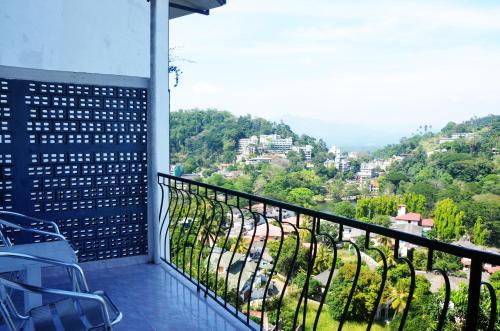 a balcony with a view of a mountain at Blinkbonnie Inn in Kandy