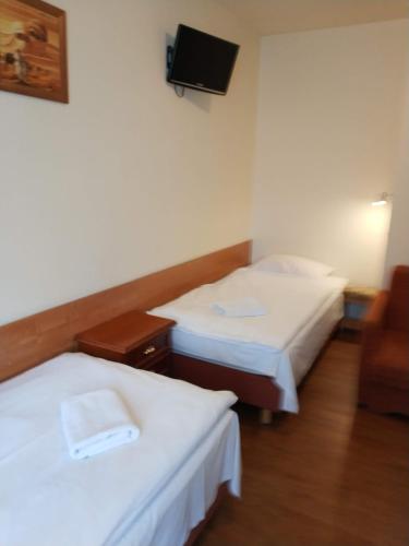 Postel nebo postele na pokoji v ubytování Hotel Górsko