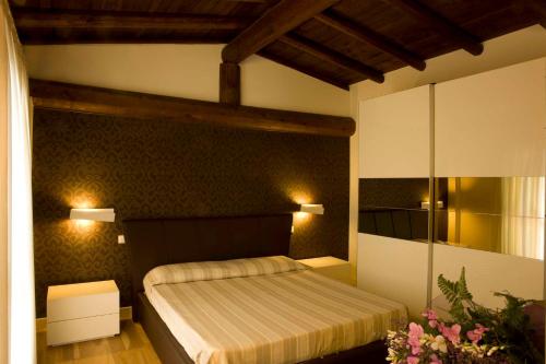 Postel nebo postele na pokoji v ubytování Corte Lantieri