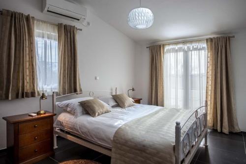Katil atau katil-katil dalam bilik di Villa Torine ZadarVillas