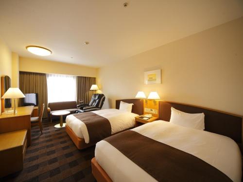 호텔 그란비아 와카야마 객실 침대