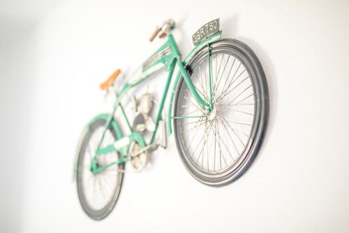 a bicycle with a bicycle frame attached to it at Sagres Sun Stay - Surf Camp & Hostel in Sagres