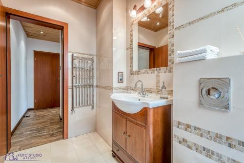 Kúpeľňa v ubytovaní Apartamenty Zdrojowa