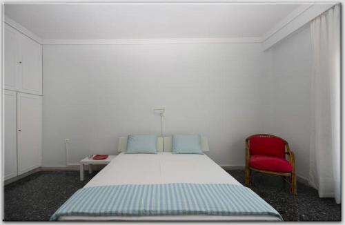 A bed or beds in a room at Anni's apartments 50m from the beach