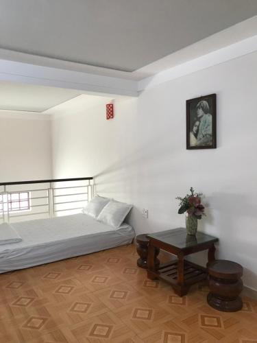 Katil atau katil-katil dalam bilik di Timothy Homestay Hue