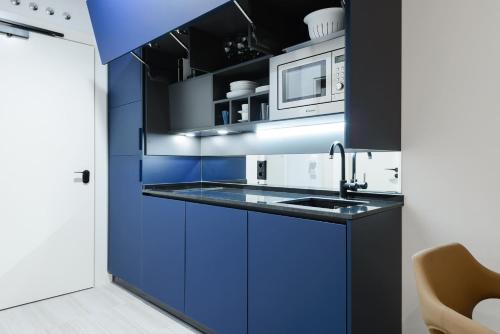 Una cocina o cocineta en Smartrental Collection Gran Vía Centric